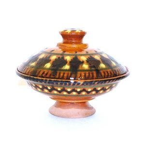 handcrafted ceramic dish with multicoloured design